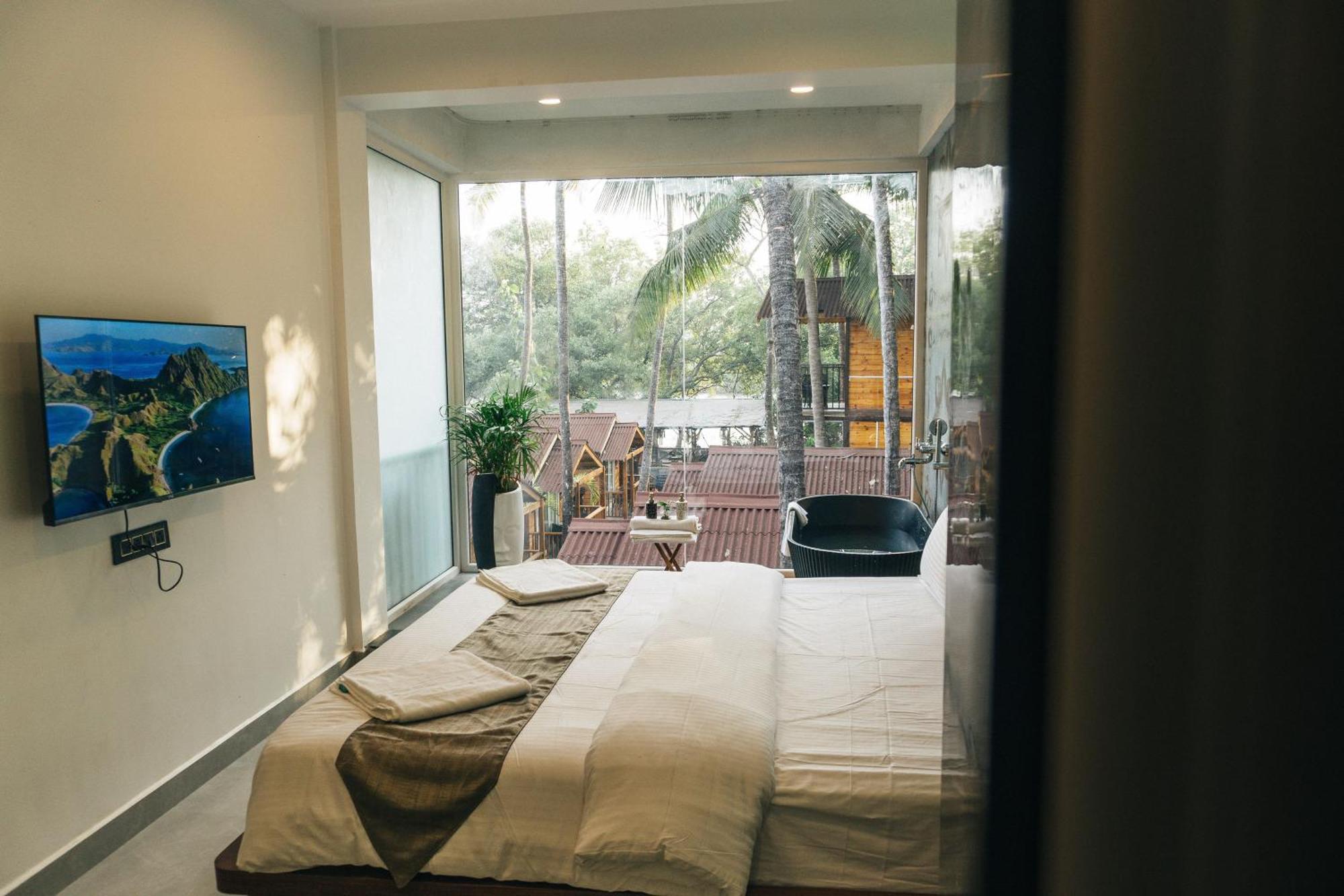 Tranquill Riverside Luxury Cottages With Bathtub, Candolim Eksteriør billede